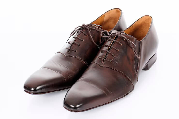 how do you shrink leather shoes