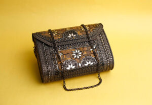 Tooled leather handbags